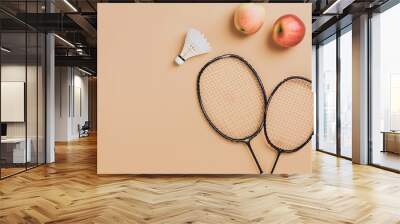 badminton racket and shuttlecock, an active sports concept Wall mural