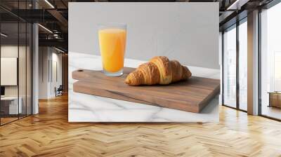 composition of good morning and breakfast fresh croissant and glass of fruit juice Wall mural