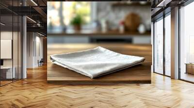 Wood table top with napkin on blurred kitchen background Wall mural