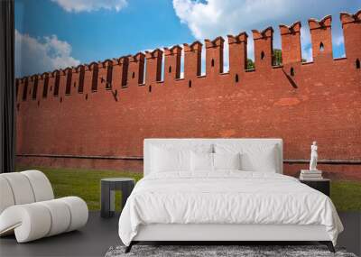 The famous Kremlin wall with dovetail crenellations. The texture of the red ancient brick Kremlin wall Wall mural