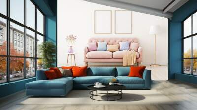 Poster mockup with two vertical frames on empty wall in living room interior with pink sofa and multi-colored pastel pillows. 3D rendering. Wall mural