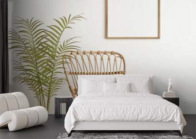 Square wooden frame mockup in warm neutral beige room interior with wicker armchair, boho pillow and palm plant in woven basket with tassels. Illustration, 3d rendering Wall mural