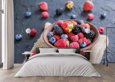 A healthy serving of fresh summer berries. Creative atmospheric decoration Wall mural