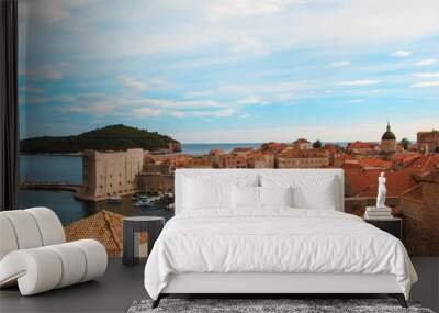 Top view of the orange tile roofs and the sea in the Italian style in Dubrovnik, Croatia Wall mural