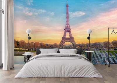 Eiffel Tower at sunset in Paris, France. Romantic travel background Wall mural