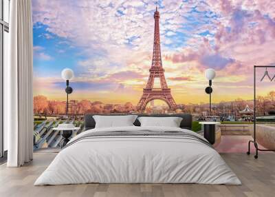 eiffel tower at sunset in paris, france. romantic travel background Wall mural