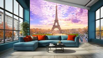 Eiffel Tower at sunset in Paris, France. Romantic travel background Wall mural