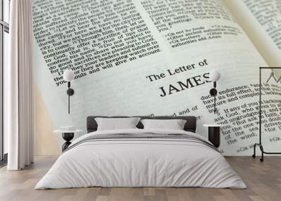 Apostle James epistle letter open Holy Bible Book close-up. New Testament Scripture. Studying the Word of God Jesus Christ. Christian biblical concept of love, faith, trust. Wall mural