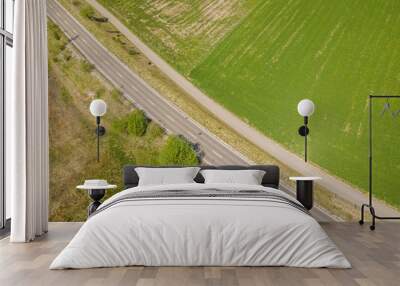 Aerial view of calm and empty road through rural Switzerland. Wall mural