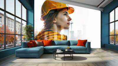 Portrait of a female construction worker in a helmet on a city background Wall mural