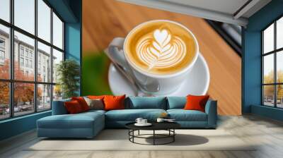 Almond milk latte art, coffee in a cup  Wall mural