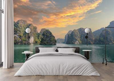 Halong Bay, Vietnam, with limestone hills and sunset sky. landscape of Ha Long bay with sunset sky, a UNESCO world heritage site and a popular tourist destination. Wall mural