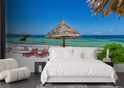 Chair and green trees on a white sand beach. Watamu, Kenya - Africa. Wall mural