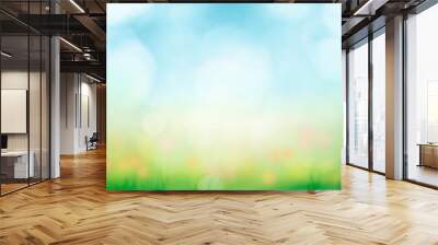 Abstract background with green grass and flowers over sunny blue sky Wall mural