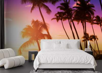 Palm tree silhouette on a background of tropical sunset Wall mural