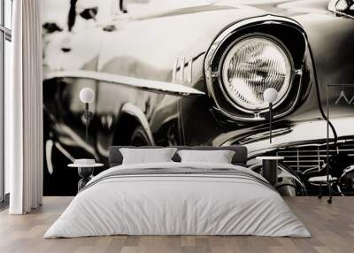 Photograph of a classic vehicle with close-up on headlights. Wall mural