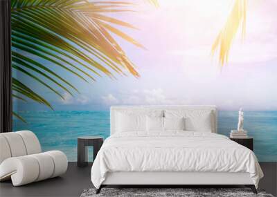 Sunny tropical Caribbean beach with palm trees and turquoise water, Caribbean island vacation, hot summer day Wall mural