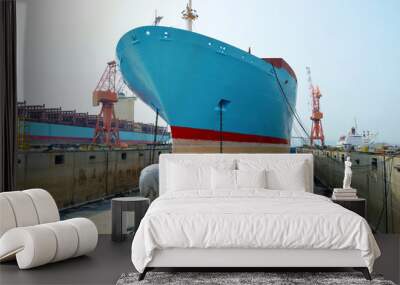 Container ship inside dry dock.  Wall mural