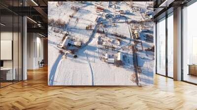 aerial view  over the harvest fields in winter Wall mural