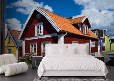 Colorful wooden houses in Bjorkholmen, the oldest district of Karlskrona, Sweden Wall mural