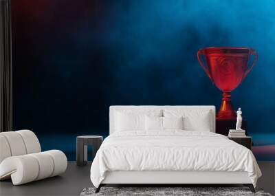 Trophy with intricate design on dark background. Sports award concept. For poster, banner and sport celebration. Trophy illuminated by red and blue lights, symbol of victory and achievement Wall mural