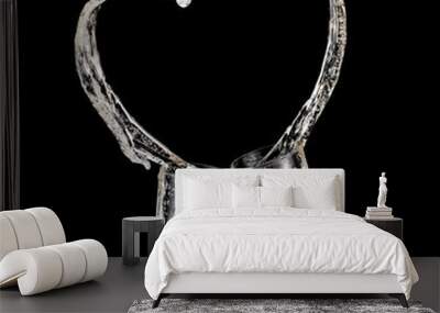 Two champagne glasses heart splash on black background Wall mural