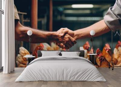 handshake between a poultry farmer and a veterinarian, with a poultry house filled with healthy chickens in the background Wall mural