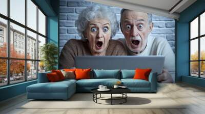 An elderly couple watching television at home in the evenings, scared by the thought of a computer, a big scare as they watch TV, frightened by the thought of watching a movie, entertainment, fun, Wall mural