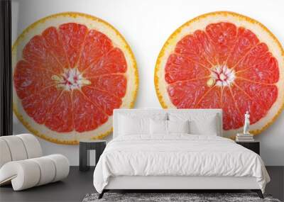 An isolated white background shows two juicy grapefruit halves Wall mural