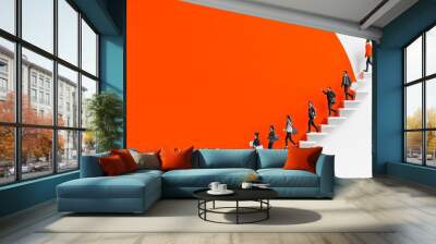 Career progress and growth are symbolized by silhouettes of people ascending steps. Wall mural