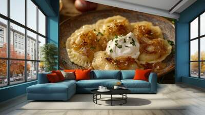 closeup of rustic brown plate with caramelized onion and cream cheese pierogies Wall mural