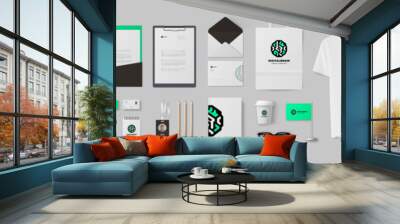 Digital style logo and corporate identity design. Branding presentation of stationery design with brain form minimalistic logo and green background. Set of basic stationery elements for start business Wall mural