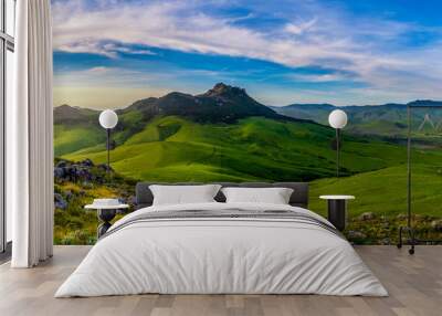 Landscape with mountains and green valley Wall mural