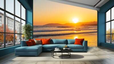 Yellow sunset at the beach over Ocean Wall mural