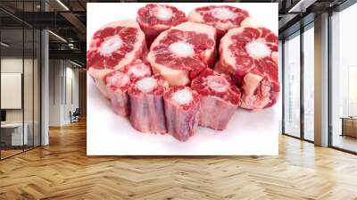 Pile of fresh raw ox tail portion on white background. Meat industry concept Wall mural