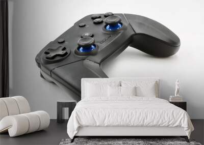 Gamepad on a white background. Game Joystick. Closeup, selective focus Wall mural