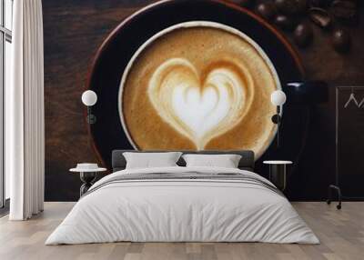  hot coffee cappuccino latte with foam top view on dark wooden background Wall mural