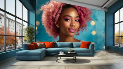 Beautiful beauty or fashion portrait of a woman with makeup with pink curly hair on a beautiful blue background  Wall mural