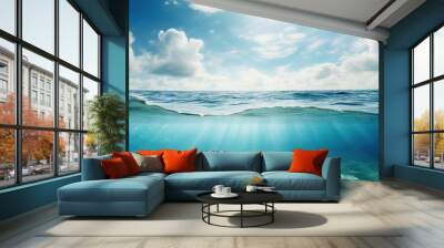 Blue sea or ocean water surface and underwater with sunny and cloudy sky Wall mural