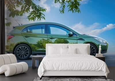 Eco friendly green car amidst lush trees Wall mural