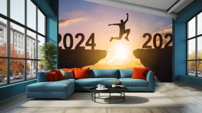 man jump between 2024 and 2025  Wall mural