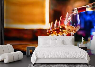 Wine serving in glasses in night club bar restaurant | Blurred background Wall mural