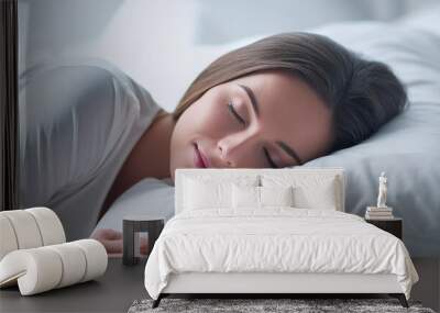 Peaceful beautiful young lady sleeping in cozy white bed on soft pillow Wall mural