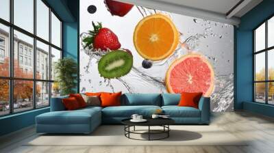 various fruits and water splashes flyon on a white background, with bold colors, strong lines, and smooth Wall mural