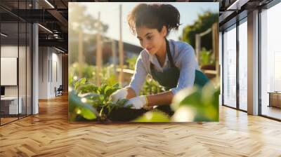 woman meticulously tending to her garden beds, ensuring the health and growth of her plants Wall mural