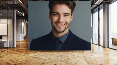 Young man with beautiful smile on grey background. Teeth whitening Wall mural