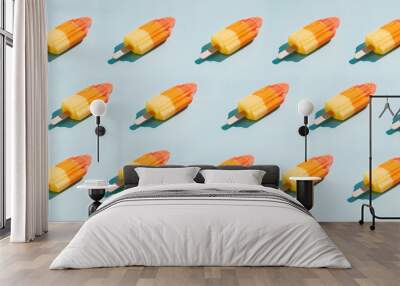 Colorful homemade ice cream/ice popsicles on pastel background. Minimal Summer concept. Flat lay. Wall mural