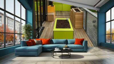 Colourfully designed roof terrace in Vienna with yellow and green furniture Wall mural