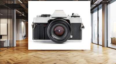 front view of a Classic analog 35 mm camera vintage and analog film rolls on white background Wall mural