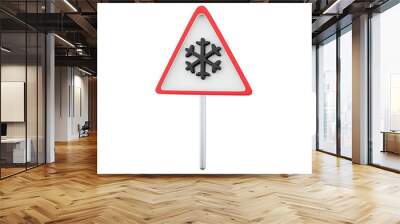 A triangular slippery road sign with a red border and a black snowflake symbol indicating slippery road conditions ahead Wall mural